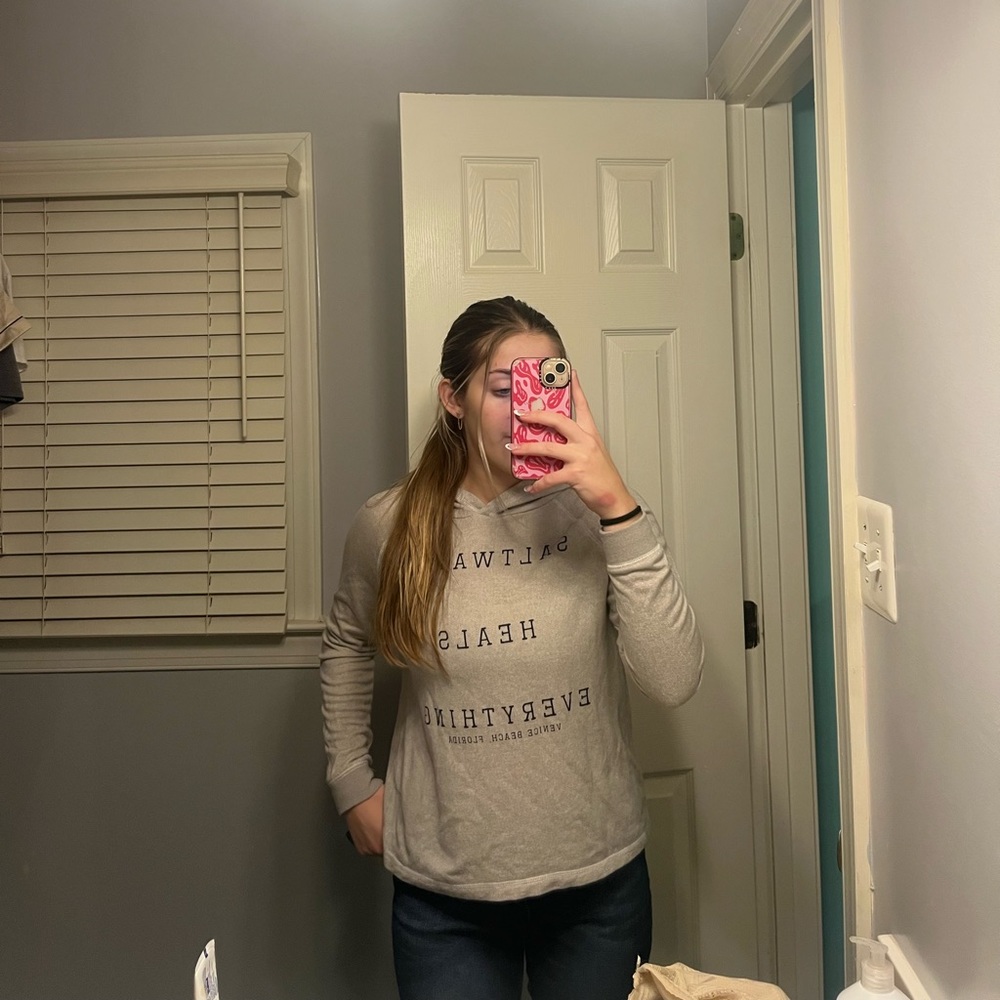 Light beige “saltwater heals everything” long sleeve hoodie